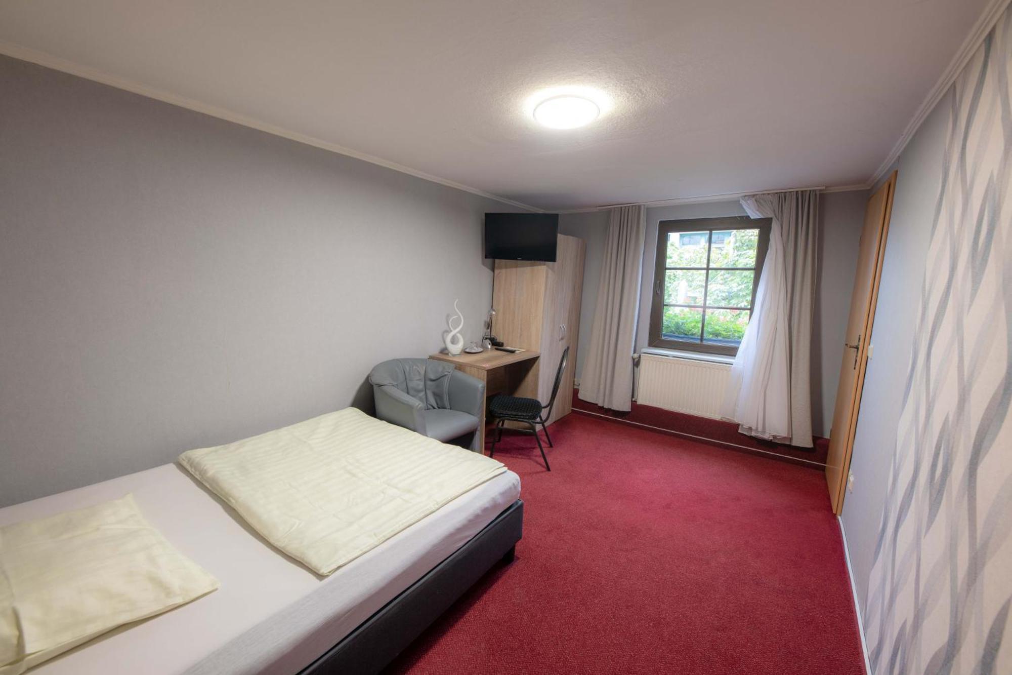 Hotel Am Rathaus Menden Bagian luar foto